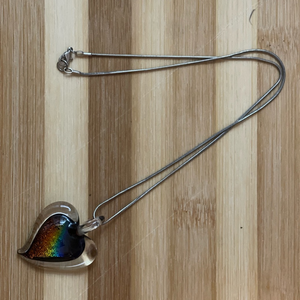 Glass heart necklace on silver tone snake chain